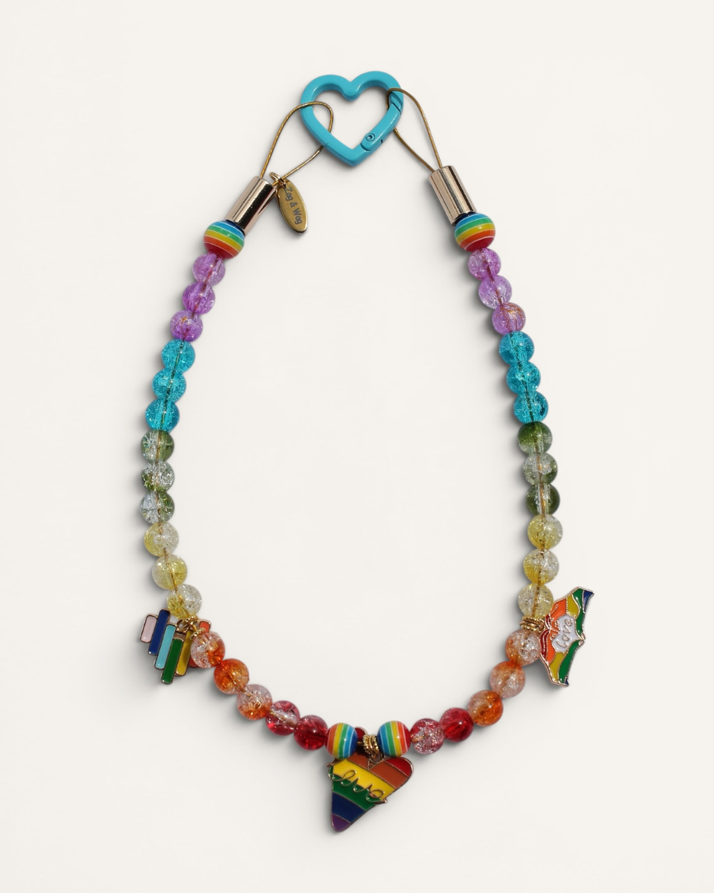 Collier pour chien rainbow translucide avec perles effet cristal, charms Pride colorés et fermoir cœur bleu – Zag & Wag