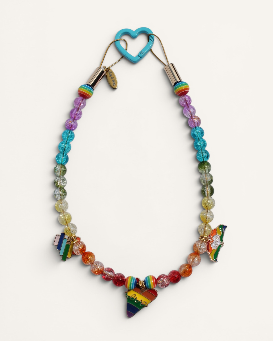 Collier pour chien rainbow translucide avec perles effet cristal, charms Pride colorés et fermoir cœur bleu – Zag & Wag