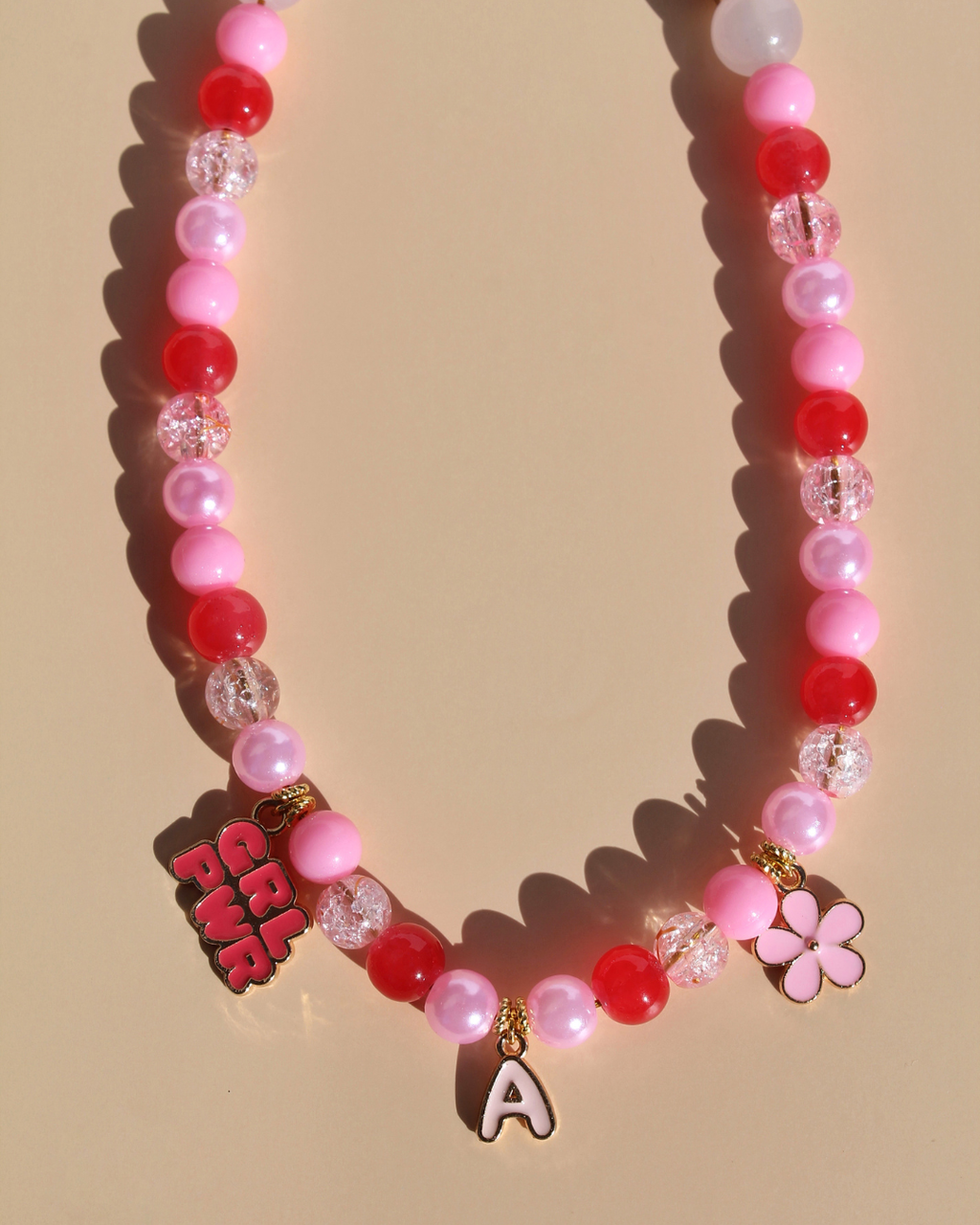 Collier artisanal rose pour chiens et chats avec charms et perles – Zag & Wag